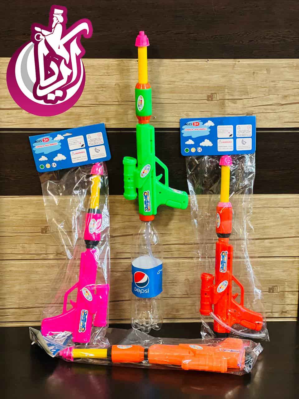 فروش عمده اسباب بازی تفنگ آب پاش بطری خور
